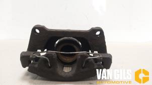 Used Front brake calliper, left Kia Sportage (SL) 1.6 GDI 16V 4x2 Price on request offered by Van Gils Automotive