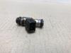 Injector (petrol injection) from a Fiat Grande Punto (199) 1.4 2010