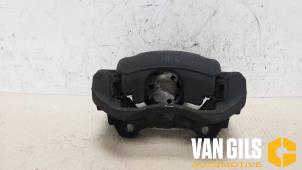 Used Front brake calliper, left Opel Corsa D 1.3 CDTi 16V ecoFLEX Price € 30,00 Margin scheme offered by Van Gils Automotive