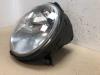 Headlight, left from a Volkswagen Lupo 1999