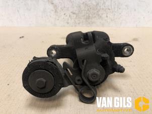 Used Rear brake calliper, left Opel Astra G (F08/48) 2.0 DTi 16V Price € 65,00 Margin scheme offered by Van Gils Automotive