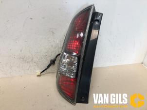 Gebrauchte Rücklicht links Daihatsu Sirion 2 (M3) 1.3 16V DVVT Preis € 45,00 Margenregelung angeboten von Van Gils Automotive
