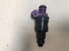 Injector (petrol injection) from a Renault Clio II (BB/CB) 1.2 2002