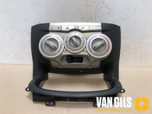 Usados Panel de control de calefacción Daihatsu Sirion 2 (M3) 1.0 12V DVVT Precio € 50,00 Norma de margen ofrecido por Van Gils Automotive