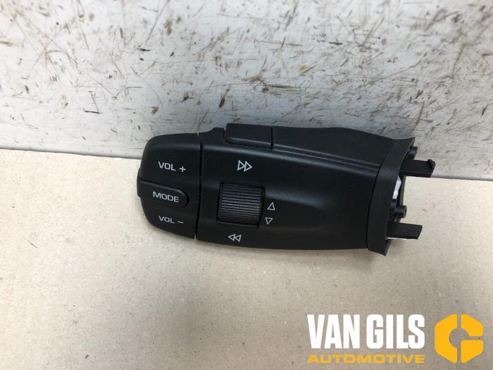 Steering wheel mounted radio control from a Seat Ibiza IV (6J5) 1.4 16V 2008