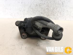 Used Front brake calliper, left Dacia Duster (HS) 1.6 16V Price on request offered by Van Gils Automotive