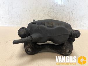 Used Front brake calliper, left Renault Master III (JD/ND/PD) 2.5 dCi 16V 100 Price on request offered by Van Gils Automotive
