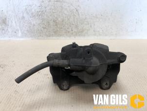 Used Front brake calliper, left Opel Corsa D 1.0 Price € 30,00 Margin scheme offered by Van Gils Automotive