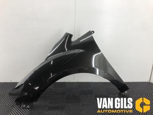 Used Front wing, left Mazda CX-7 2.2 MZR-CD 16V Price on request offered by Van Gils Automotive