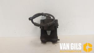 Używane Zacisk hamulcowy lewy przód Volkswagen Up! (121) 1.0 12V 75 Cena na żądanie oferowane przez Van Gils Automotive