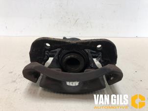 Used Front brake calliper, left Opel Corsa C (F08/68) 1.2 16V Price € 70,00 Margin scheme offered by Van Gils Automotive