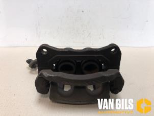 Used Front brake calliper, left Mazda CX-7 2.2 MZR-CD 16V Price on request offered by Van Gils Automotive