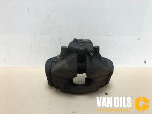 Used Front brake calliper, left Volkswagen Transporter/Caravelle T4 2.5 TDI Price € 70,00 Margin scheme offered by Van Gils Automotive