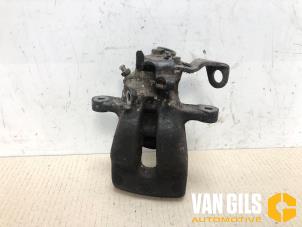 Used Rear brake calliper, left Opel Zafira (F75) 2.0 DTI 16V Price € 65,00 Margin scheme offered by Van Gils Automotive