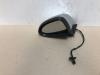 Wing mirror, left from a Opel Corsa D 1.4 16V Twinport 2007