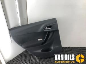 Used Rear door trim 4-door, left Citroen C3 (SC) 1.2 VTi 82 12V Price on request offered by Van Gils Automotive