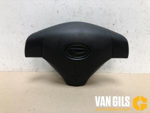 Używane Poduszka powietrzna lewa (kierownica) Daihatsu Cuore (L251/271/276) 1.0 12V DVVT Cena na żądanie oferowane przez Van Gils Automotive