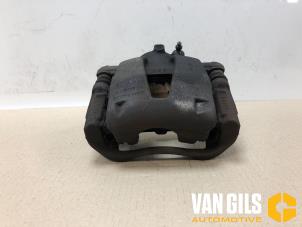 Used Front brake calliper, left Opel Corsa D 1.2 16V Price on request offered by Van Gils Automotive