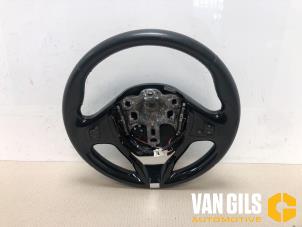 Used Steering wheel Renault Clio IV (5R) 1.5 Energy dCi 90 FAP Price on request offered by Van Gils Automotive