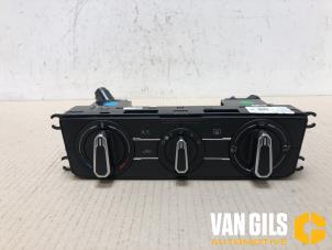 Usados Panel de control de calefacción Volkswagen Polo VI (AW1) 1.0 TSI 12V Precio € 49,99 Norma de margen ofrecido por Van Gils Automotive