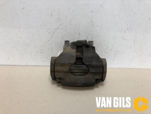 Used Front brake calliper, left Volkswagen Transporter T5 2.0 TDI DRF Price on request offered by Van Gils Automotive