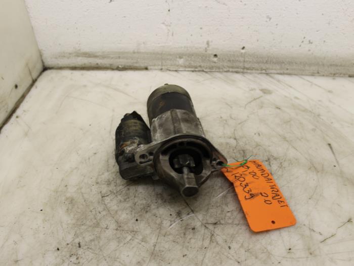 Begagnade Startmotor Hyundai Trajet 2.0 16V Pris € 35,00 Marginaltabell erbjuds av Van Gils Automotive