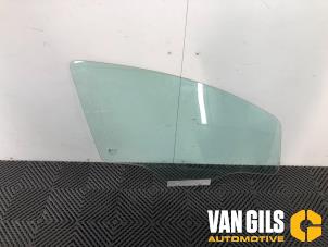 Used Door window 4-door, front right Opel Corsa D 1.2 16V Price on request offered by Van Gils Automotive