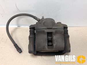 Used Front brake calliper, right Dacia Sandero I (BS) 1.2 16V Price on request offered by Van Gils Automotive
