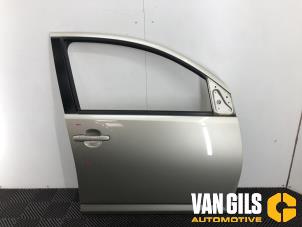 Usagé Porte avant droite Daihatsu Sirion 2 (M3) 1.3 16V DVVT Prix € 100,00 Règlement à la marge proposé par Van Gils Automotive