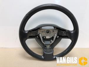 Used Steering wheel Daihatsu Sirion 2 (M3) 1.3 16V DVVT Price € 50,00 Margin scheme offered by Van Gils Automotive