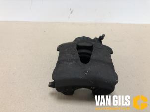 Used Front brake calliper, left Volkswagen Fox (5Z) 1.2 Price € 70,00 Margin scheme offered by Van Gils Automotive