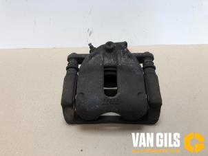 Used Front brake calliper, right Renault Clio III (BR/CR) 1.2 16V Tce Price on request offered by Van Gils Automotive