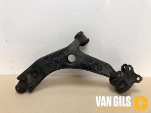 Używane Wahacz zawieszenia prawy przód Ford Focus 2 1.4 16V Cena na żądanie oferowane przez Van Gils Automotive