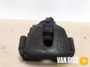 Used Front brake calliper, left Ford Focus 2 1.4 16V Price on request offered by Van Gils Automotive
