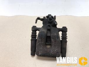 Used Rear brake calliper, left Renault Clio III (BR/CR) 1.2 16V Tce Price on request offered by Van Gils Automotive