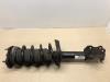 Front shock absorber rod, left from a Peugeot Bipper (AA) 1.4 HDi 2008