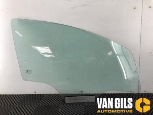 Used Door window 4-door, front right Opel Corsa D 1.4 16V Twinport Price on request offered by Van Gils Automotive