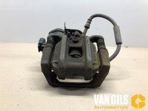 Used Rear brake calliper, left BMW 5 serie Touring (F11) 525d 16V Price on request offered by Van Gils Automotive