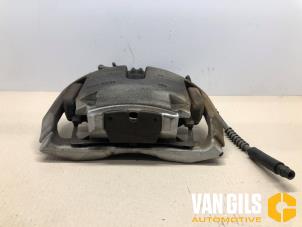 Used Front brake calliper, left BMW 5 serie Touring (F11) 525d 16V Price on request offered by Van Gils Automotive