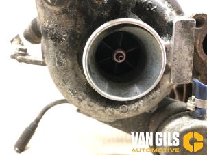 Turbo van een Fiat Doblo Cargo (223) 1.9 JTD 2005