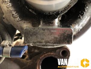 Turbo van een Fiat Doblo Cargo (223) 1.9 JTD 2005