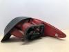 Taillight, left from a Peugeot 206 CC (2D) 1.6 16V 2001