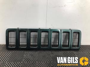 Used Grille Jeep Grand Cherokee (ZJ) 5.2i V8 Price on request offered by Van Gils Automotive