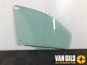 Used Door window 4-door, front right Dacia Lodgy (JS) 1.2 TCE 16V Price on request offered by Van Gils Automotive