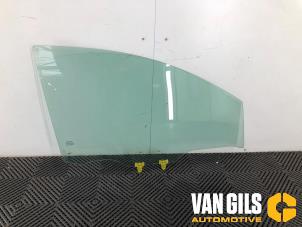Used Door window 4-door, front right Nissan Note (E11) 1.6 16V Price on request offered by Van Gils Automotive
