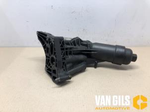 Used Oil filter housing BMW 5 serie (G30) 530e iPerformance Price on request offered by Van Gils Automotive