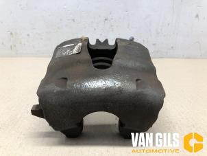 Used Front brake calliper, left Volkswagen Polo VI (AW1) 1.0 TSI 12V BlueMotion Price on request offered by Van Gils Automotive