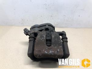 Used Rear brake calliper, right Renault Scénic III (JZ) 1.2 16V TCe 115 Energy Price on request offered by Van Gils Automotive