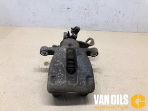 Used Rear brake calliper, left Mini Mini (R56) 1.6 16V Cooper S Price on request offered by Van Gils Automotive