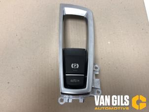 Used Parking brake switch BMW 5 serie (F10) 535i 24V TwinPower Turbo Price on request offered by Van Gils Automotive